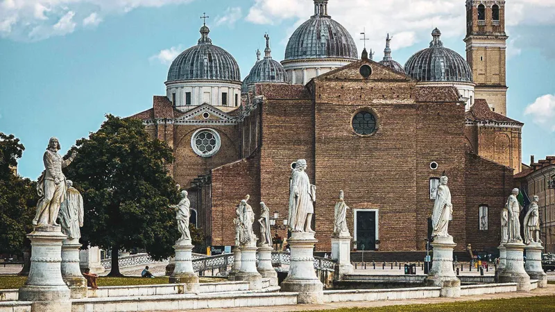 Local host leading a guided Padua tour through historic squares in Padua, Italy