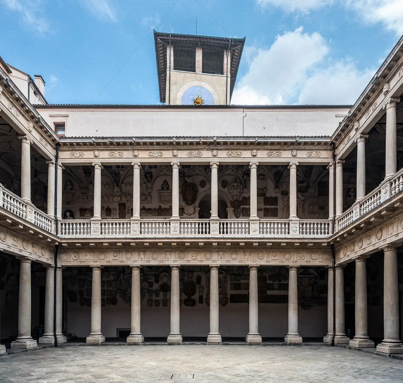 Sixteenth-century Cortile Antico of Palazzo Bo covered with student coats of arms at the University of Padua